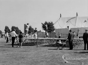 Dagenham Town Show 1970, showing trampolining children and marquee in background, 1970