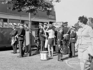 Dagenham Town Show 1970, showing bandsmen beside their private bus, and others, 1970