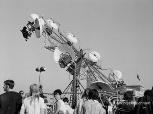Dagenham Town Show 1970, showing fairground with spectators by chair-o-plane, 1970