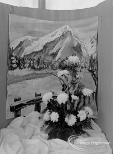 Dagenham Town Show 1970, showing horticulture exhibition with display of chrysanthemums against image of snow-capped mountains, 1970