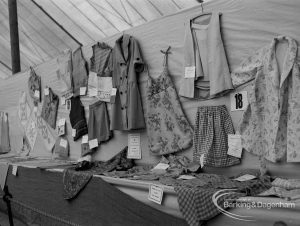 Dagenham Town Show 1970, showing stand displaying homemade dresses, coats, et cetera, 1970