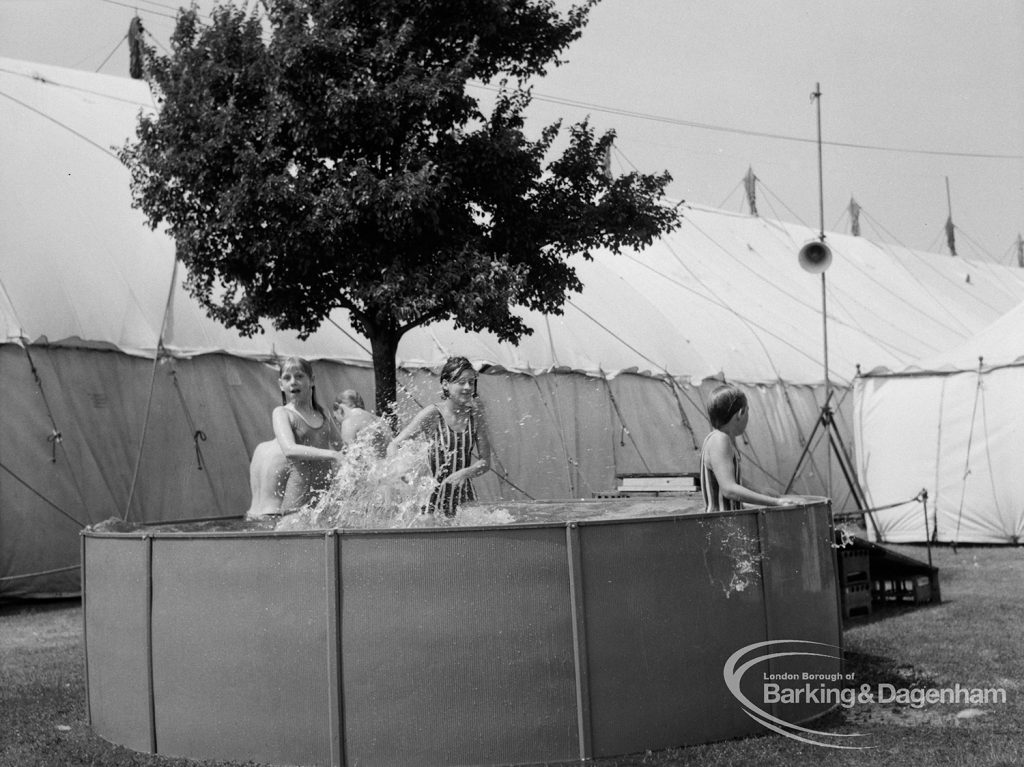 Dagenham Town Show 1970, showing children splashing in small circular swimming pool, 1970