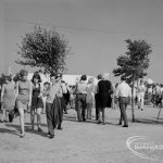 Dagenham Town Show 1970, showing groups of visitors walking about an avenue, 1970