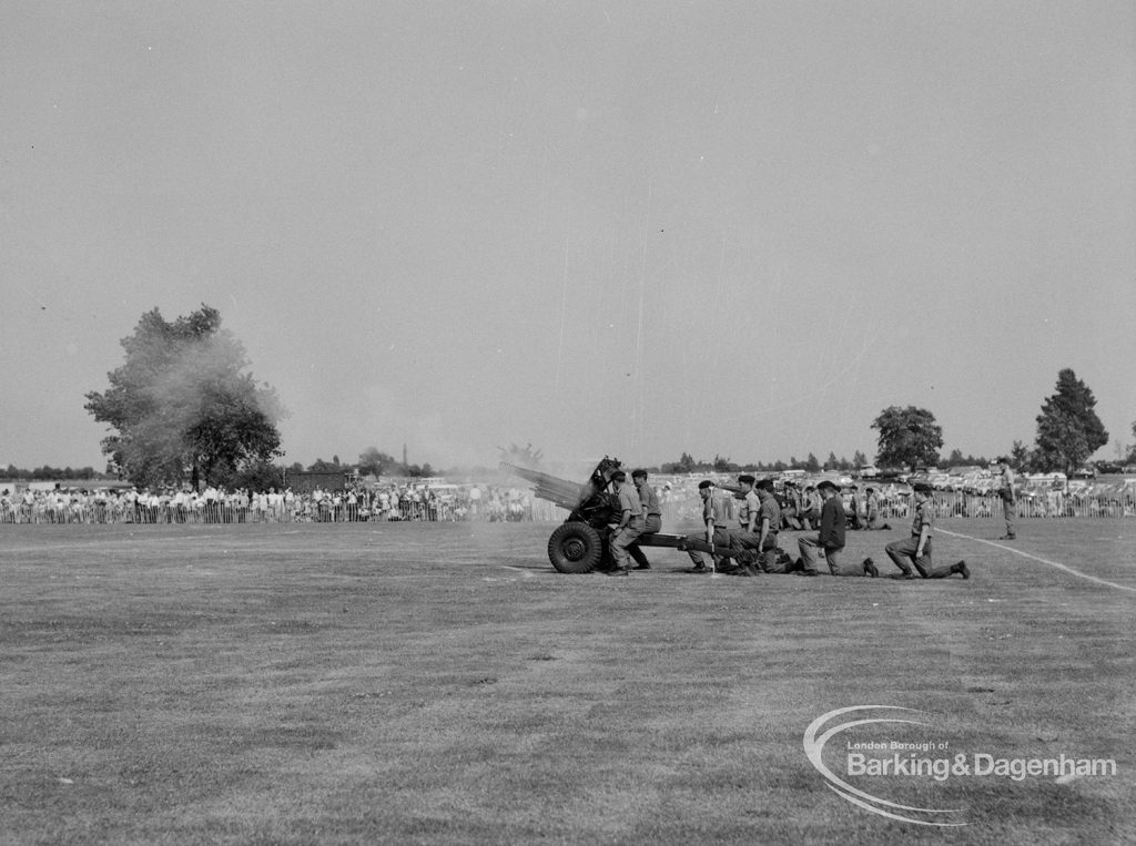 Dagenham Town Show 1970, showing the Army firing its light guns in the arena, and smoke, 1970