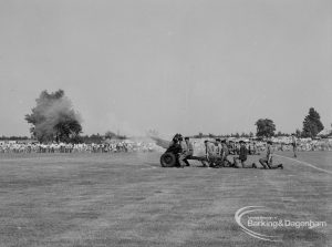 Dagenham Town Show 1970, showing the Army firing its light guns in the arena, and smoke, 1970