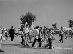 Dagenham Town Show 1970, showing family groups and other visitors walking around, 1970