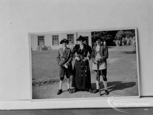 Photographic negative copy of old Valence House Museum photograph, showing group of three men in eighteeneth century dress [possibly outside Valence House], 1970