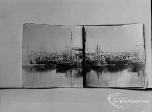 Photographic negative copy of old Valence House Museum photograph, showing two small joined photographs by L G Barratt of fishing boats [possibly in Barking], 1970