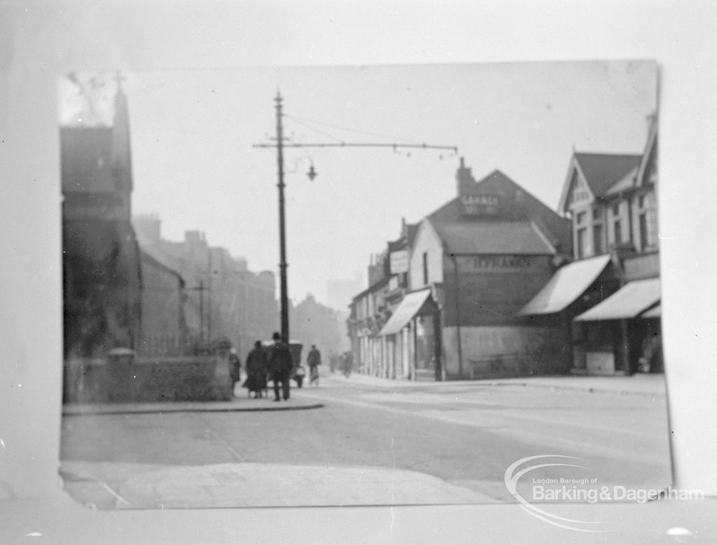 Photographic negative copy of old Valence House Museum photograph, showing East Street, Barking before alteration [dated pre-1929], with St Margaret’s Parish Church Tower in background, 1970