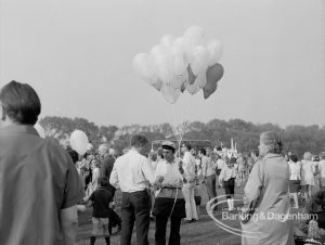 Barking Carnival 1970, showing balloon seller and a crowd of visitors, 1970
