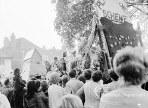 Barking Carnival 1970, showing spectators gathered around Playleaders’ Scheme float, 1970