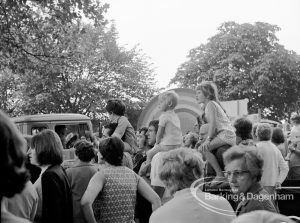 Barking Carnival 1970, showing group of spectators, with children sitting on parents’ shoulders to get a better view, 1970