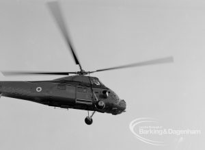The Duke of Edinburgh’s visit to Cambell School, Langley Crescent, Dagenham, showing helicopter approaching, 1970