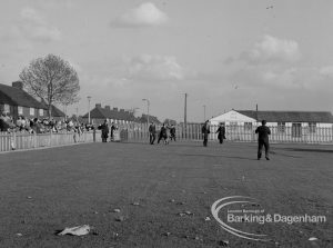 The Duke of Edinburgh’s visit to Cambell School, Langley Crescent, Dagenham, showing spectators at landing ground with Goresbrook Road on left, 1970