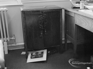 Valence House, Dagenham break-in and robbery of Museum exhibits, showing a cabinet forced open and photograph below it, 1970