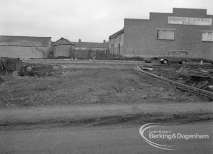 Dagenham old village housing development, showing the covered-in stream with Crown Garage in background, 1971