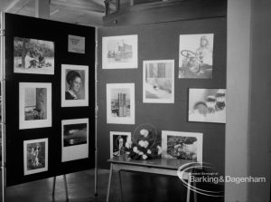 Exhibition at Rectory Library, Dagenham, showing display stand featuring work by local photographers from Dagenham Camera Club, 1971