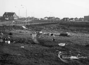 Gypsy encampment, showing site with corrugated iron, bowl and curtains left behind after gypsies left in February, 1971
