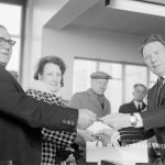 Welfare, with the introduction of bus permits for certain elderly people, showing Hanna Ludden and Sidney Holloway receiving first permits from Councillor Tibble during first day of issue, 1971
