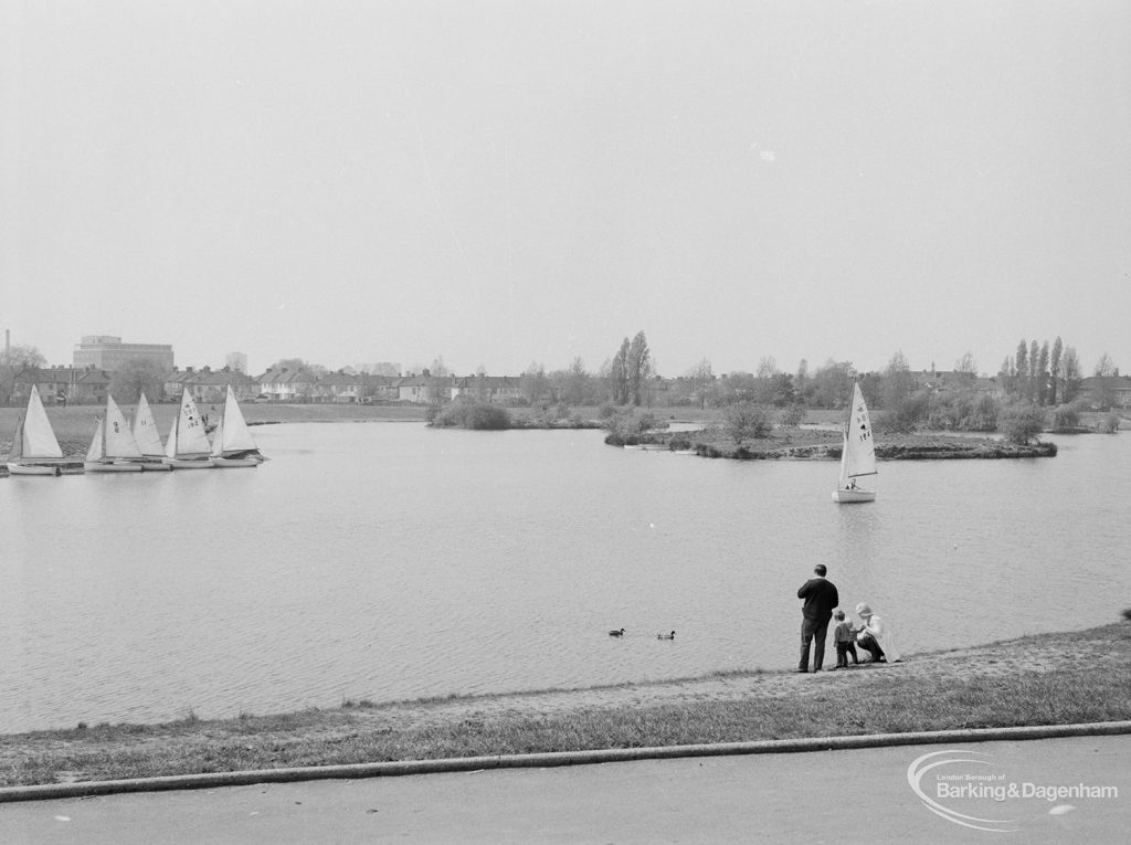 Mayesbrook Park, Dagenham, showing sailing yachts and people standing on bank, 1971