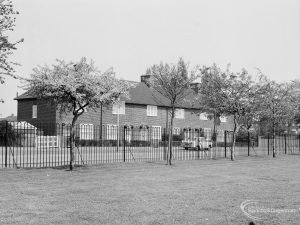 Housing, showing houses with trees lining street outside to the east, 1971