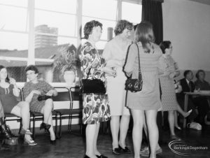 London Borough of Barking Libraries Department, showing members of staff including Joan Evenden and Ann Long at retirement celebration for Mr William McKenzie, 1971