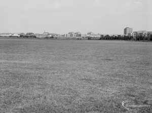 Undeveloped land at The Leys, Dagenham, showing view across fields towards Ballards Road and Leys Swimming Pool, 1971