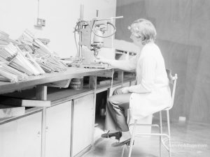 London Borough of Barking Welfare Department, Gascoigne Training Centre for Adults, showing woman operating lathe, 1971