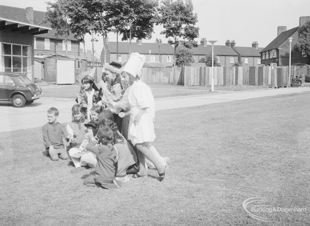London Borough of Barking Libraries Department performance of play ‘The Knave of Hearts’ in grounds of Fanshawe Library, Dagenham and with Halbutt Street in background, produced by Mrs Jean Hickman, 1971