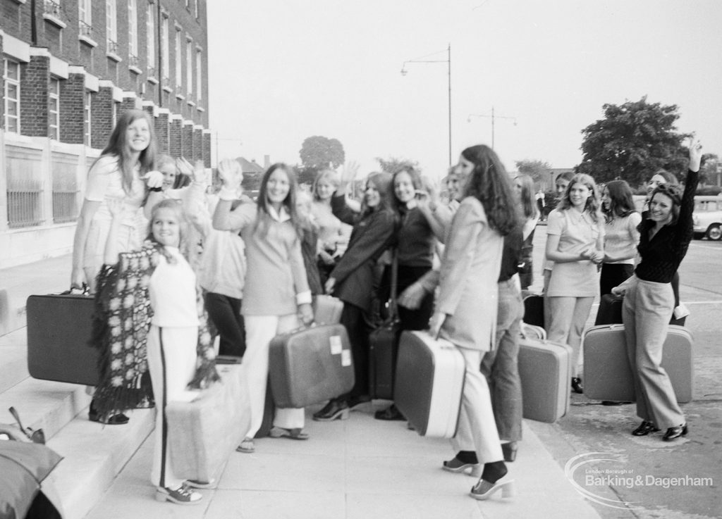 Playleader Scheme Majorettes with their luggage, outside Civic Centre, Dagenham prior to departure for France for the first International Majorette Competition, 1971