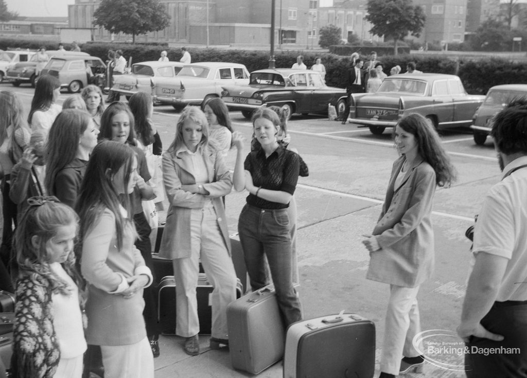 Playleader Scheme Majorettes with their luggage, outside Civic Centre, Dagenham prior to departure for France for the first International Majorette Competition, 1971