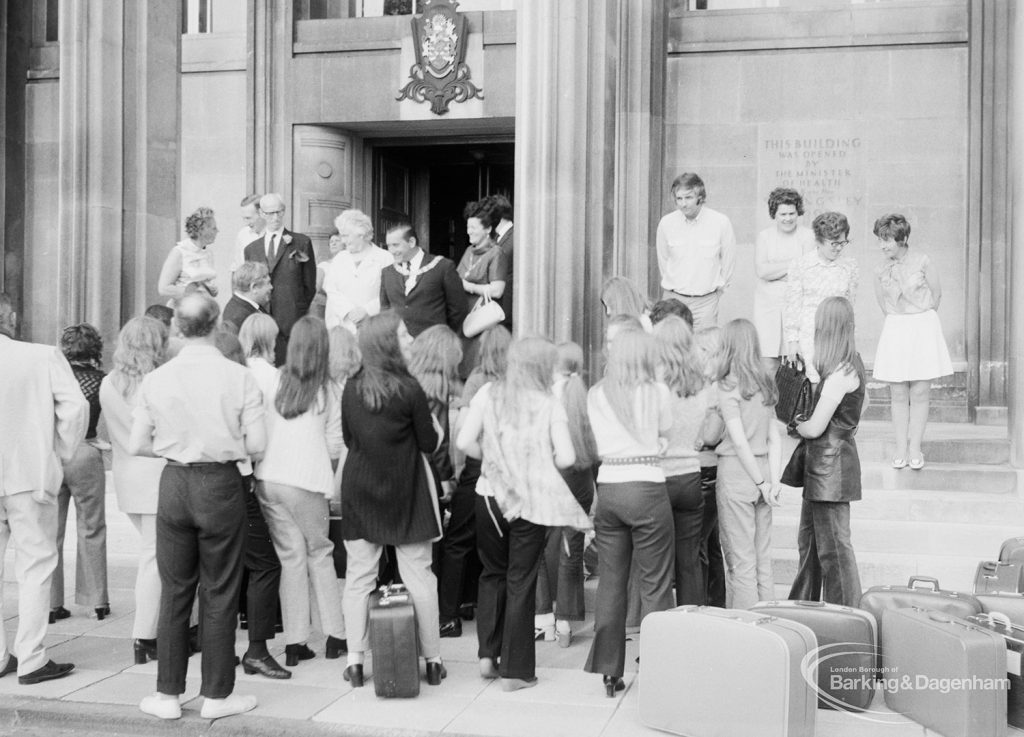 Playleader Scheme Majorettes clustered around Mayor Councillor Matthew J Spencer at door of Civic Centre, Dagenham prior to departure for France for the first International Majorette Competition, 1971