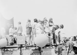 Dagenham Town Show 1971, showing Playgroup carnival float with balloons during judging in Old Dagenham Park, 1971
