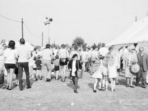 Dagenham Town Show 1971 at Central Park, Dagenham, showing a crowded avenue, with marquee and tannoy system, 1971