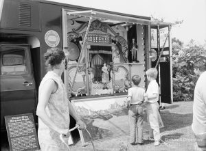 Dagenham Town Show 1971 at Central Park, Dagenham, showing children and adults watching the fairground steam organ, 1971