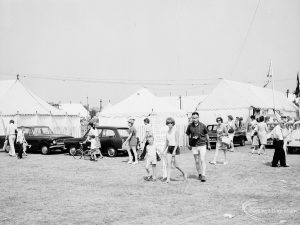 Dagenham Town Show 1971 at Central Park, Dagenham, showing groups of visitors with several marquees behind them,1971