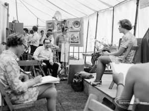 Dagenham Town Show 1971 at Central Park, Dagenham, showing Barking Art Society display with students sketching a model,1971