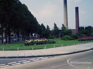 Britain in Bloom competition, showing corner of Bull Lane and Rainham Road North, Dagenham, taken from Salvage Plant and including chimneys, 1971
