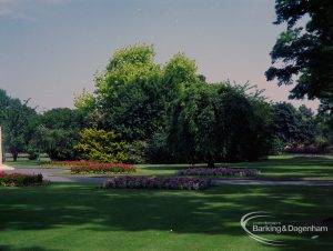 Britain in Bloom competition, showing gardens with trees and flowerbeds near War Memorial in Barking Park, 1971