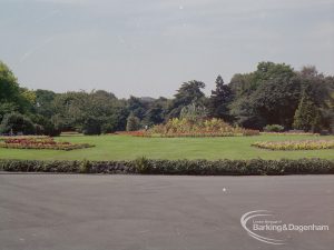 Britain in Bloom competition, showing gardens with distant view of circular flowerbed near War Memorial in Barking Park, 1971