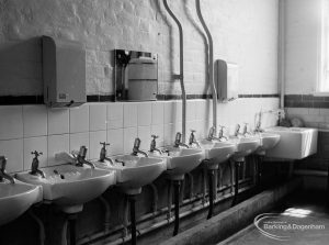 Village Infants School, Church Elm Lane, Dagenham interior [closed 23 July 1971], showing row of washbasins, 1971