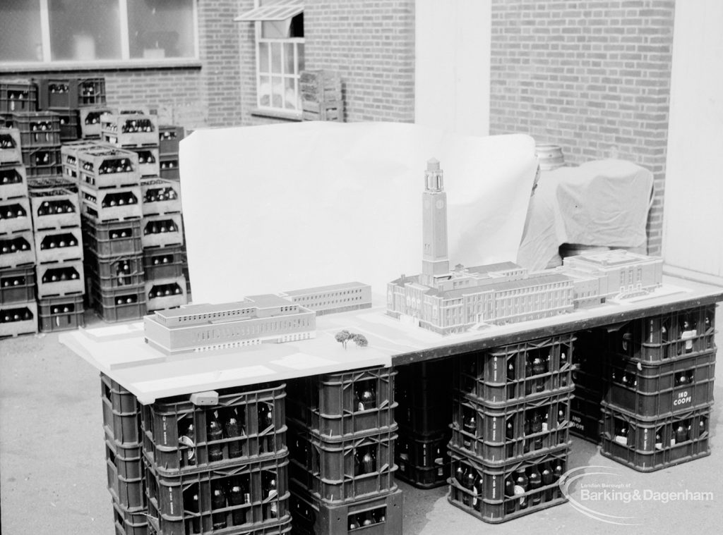 London Borough of Barking, Architect’s Department model of new Barking Library, showing view of the whole complex with piazza, Town Hall and Assembly Hall from distance, taken from south-east and mounted on metal crates in Town Hall yard, 1971