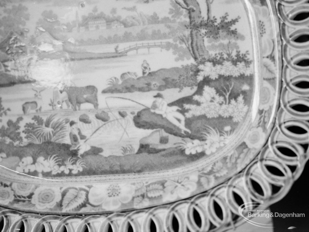 Victoria and Albert exhibition of English transfer-printed pottery and porcelain at Rectory Library, Dagenham, showing section of scene and decorative border on large dish, 1971