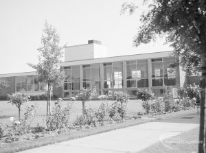 Exterior of John Preston School, Rose Lane, Marks Gate in its grounds with rose garden, looking from west, 1971