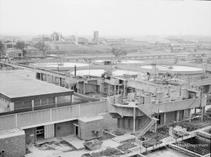 Sewage Works Reconstruction (Riverside Treatment Works) XXII, showing aerial view of construction of pump house, looking east with Dagenham Village behind, 1971