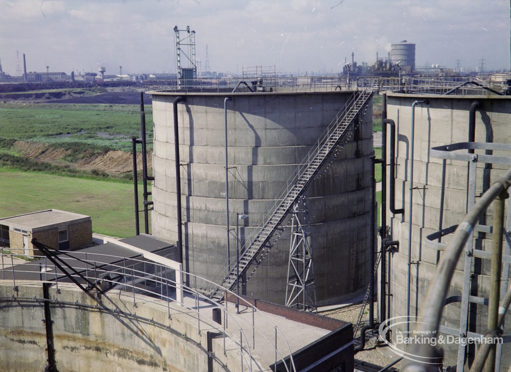 Sewage Works Reconstruction (Riverside Treatment Works) XXII, showing aerial view of tall holder with ladder and pipes, 1971