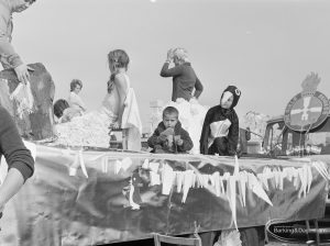 Assembly and departure of Barking Carnival 1971 from Mayesbrook Park, showing The Girls’ Brigade float, 1971