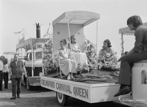 Assembly and departure of Barking Carnival 1971 from Mayesbrook Park, showing float with Chelmsford Carnival Queen and attendants, 1971