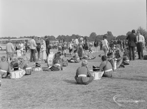 Barking Carnival 1971 from Mayesbrook Park, showing crowds and children with instruments, waiting to perform in the Junior Band, 1971