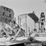 Assembly and departure of Barking Carnival 1971 from Mayesbrook Park, showing float entitled ‘The Four Seasons’ with a carnival queen and group of children, 1971